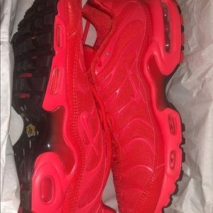 Women’s red Nike shoes